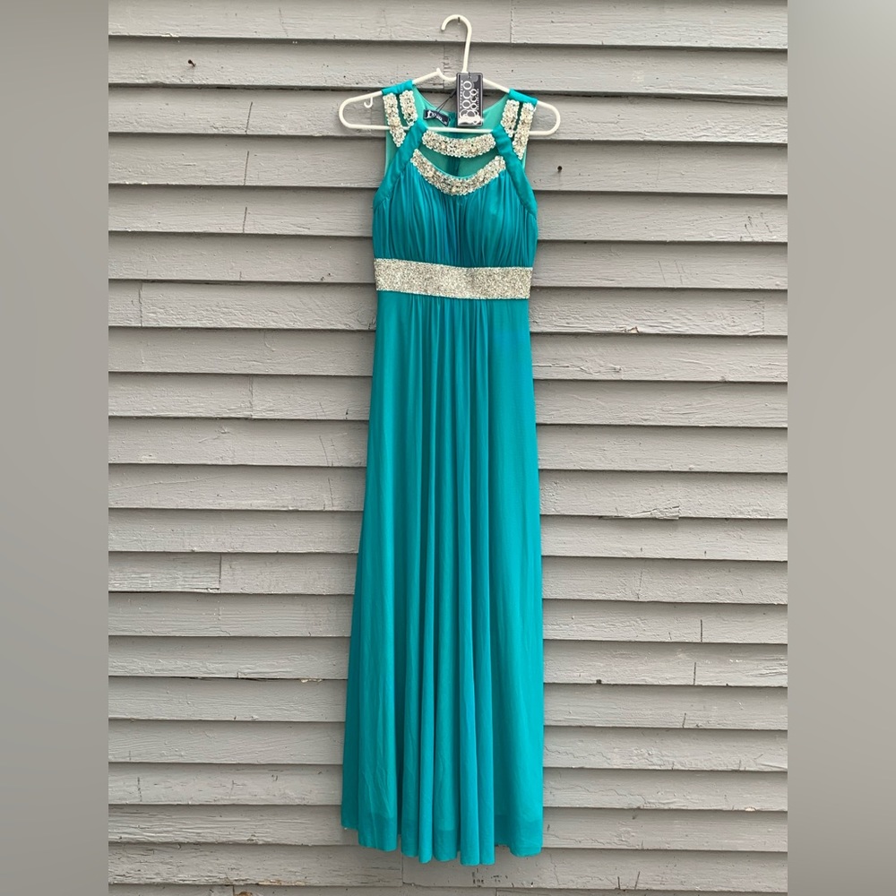 Evening Gown by Coco Collection.  Size M.